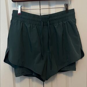90 degree dark teal running shorts. Size Lg